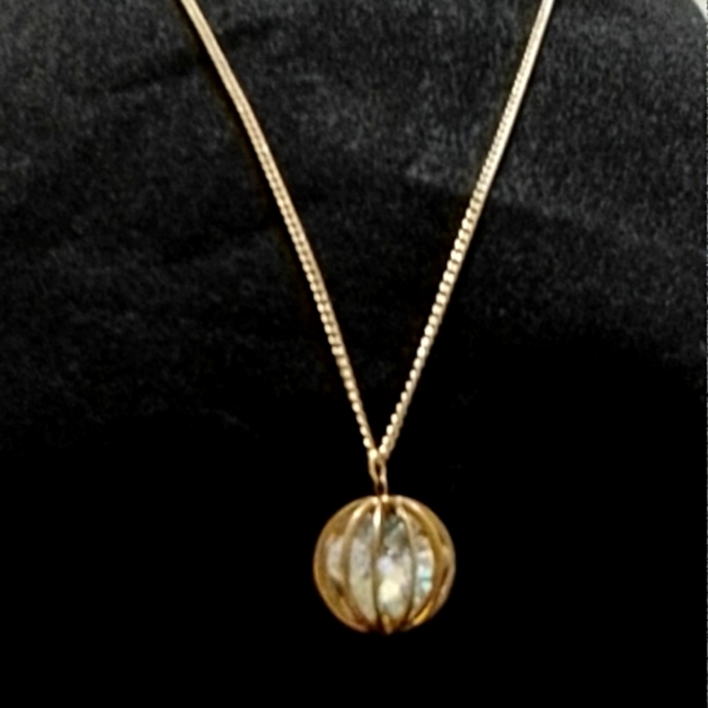 Vintage Originalities Inc. NY.&.NY Gold tone Cage Pendant with AB Crystals